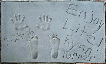 Ryan Turner hand prints in cement